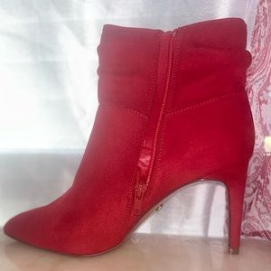 Women’s new red booties with heels. Size 6.5